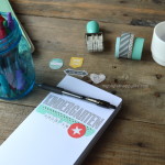 A scrapbook or traveler's notebook to document your child's school year; How to Document Your Child's School Years #MyGo2Pen #ad | mybigfathappylife.com