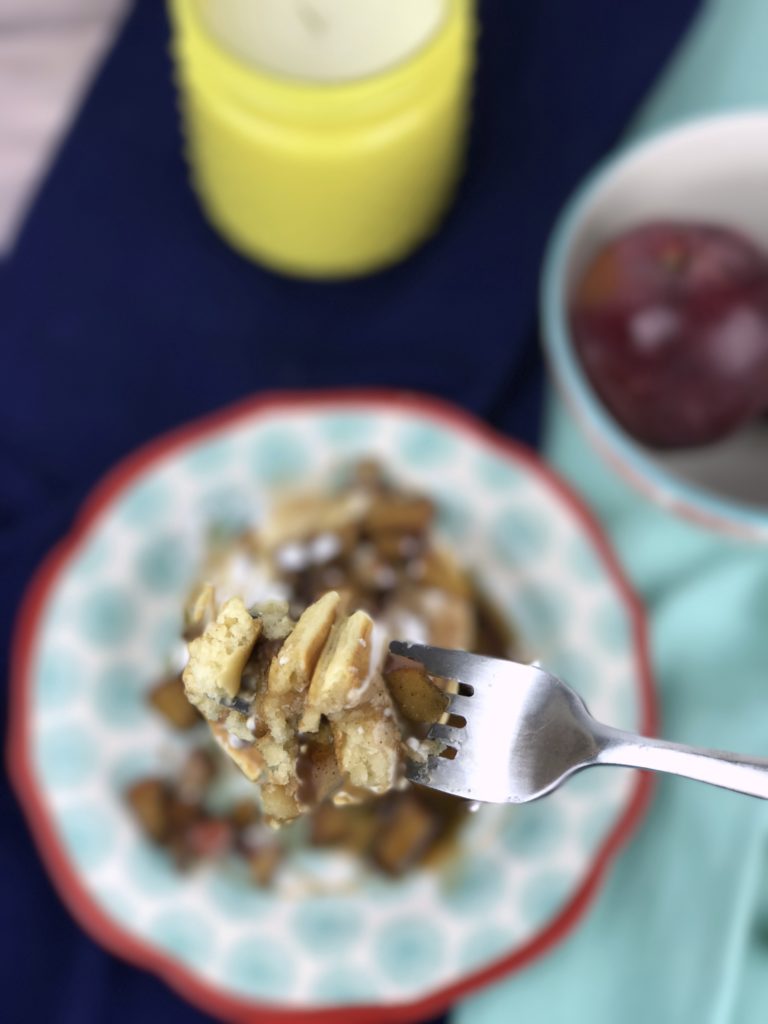 Old fashioned and fluffy pancakes topped with sour cream, fresh apples cooked in a cinnamon syrup glaze and powdered sugar make these Apple Cinnamon Pancakes the best fall recipe for breakfast, brunch, or dinner.