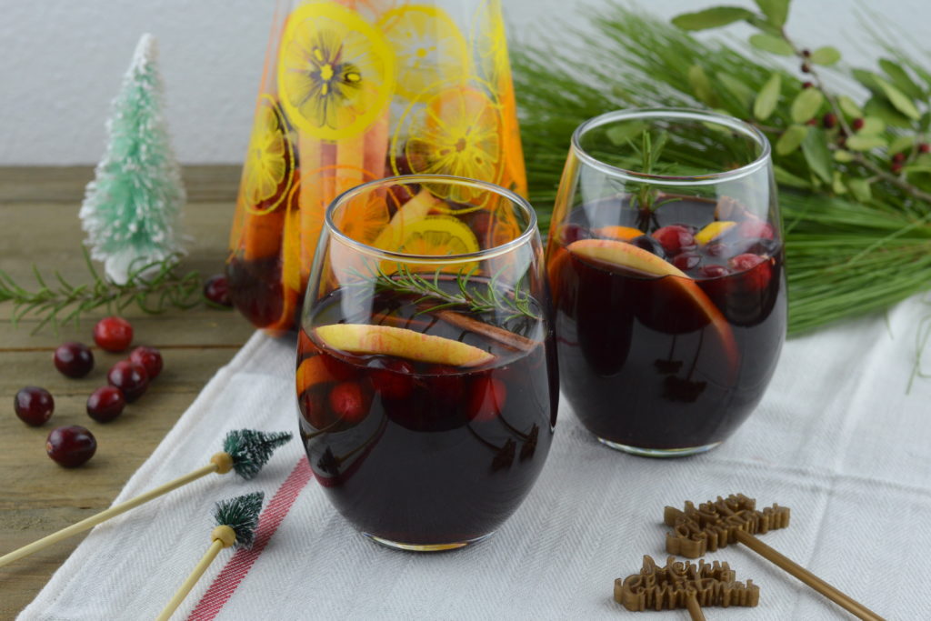 Holiday Sangria - Filled with citrus, cranberries, crisp apple, and cinnamon for one irresistible drink!