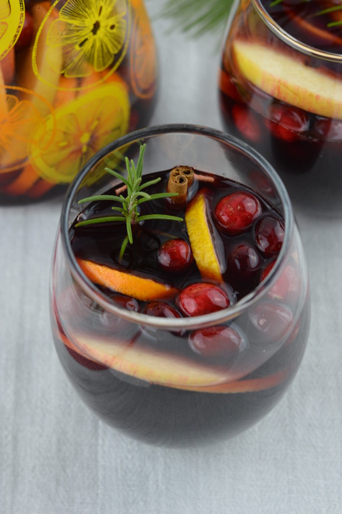 Holiday Sangria - Filled with citrus, cranberries, crisp apple, and cinnamon for one irresistible drink!