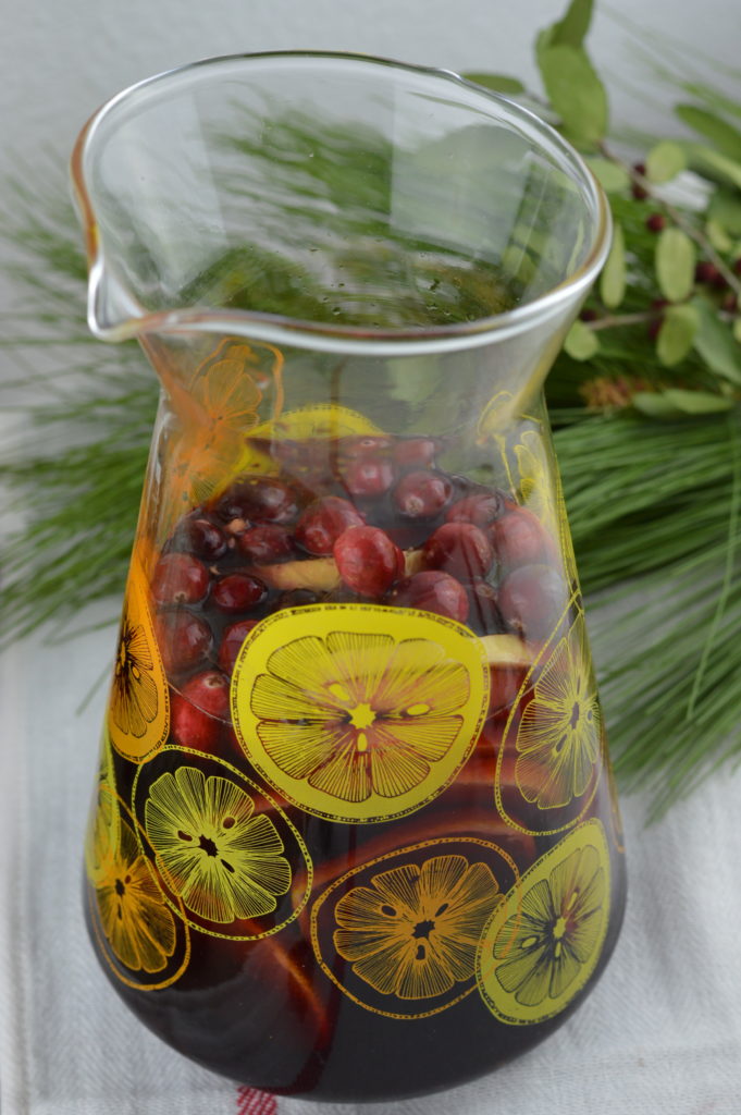 Holiday Sangria - Filled with citrus, cranberries, crisp apple, and cinnamon for one irresistible drink!