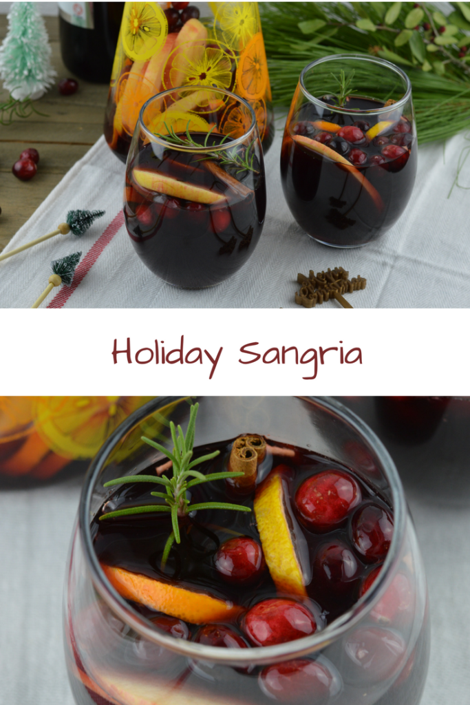 Holiday Sangria - Filled with citrus, cranberries, crisp apple, and cinnamon for one irresistible drink!