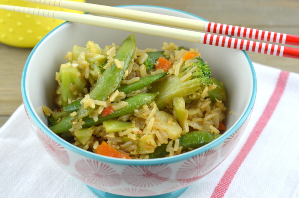 This vegetable fried rice recipe will make the entire family happy! It's full of vegetables, lots of flavors, and can be made in under 20 minutes. #simpleswaps #ad | mybigfathappylife.com