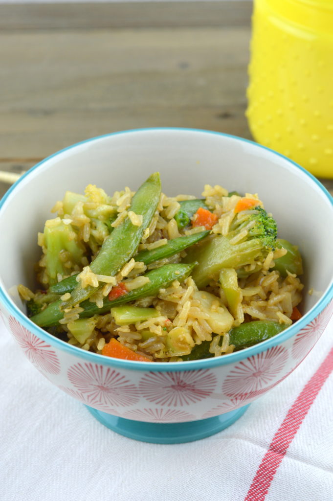 This vegetable fried rice recipe will make the entire family happy! It's full of vegetables, lots of flavors, and can be made in under 20 minutes. #simpleswaps #ad | mybigfathappylife.com