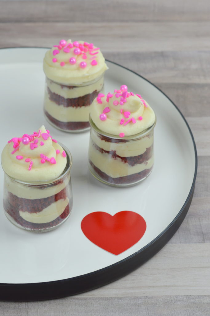 Red Velvet Cupcakes in a Jar are moist, soft cupcakes layered with rich, fluffy cream cheese frosting.