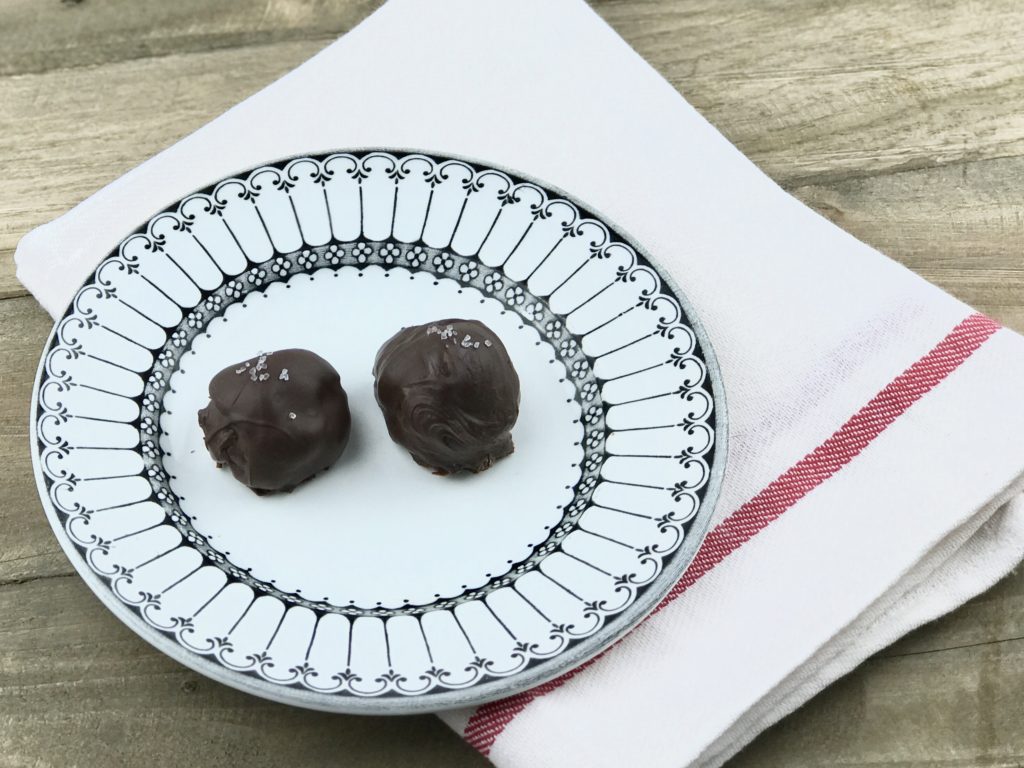 Salted Dark Chocolate Truffles with a creamy ganache center rolled in melted chocolate.