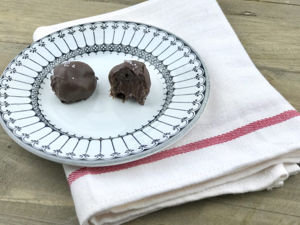 Salted Dark Chocolate Truffles with a creamy ganache center rolled in melted chocolate.