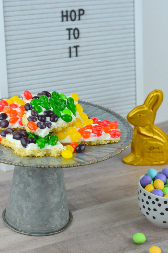 Rainbow Sugar Cookie Bark is super playful and fun for Easter. Each piece has multiple colors of STARBURST® Jellybeans - "Hop to It" & taste the rainbow!