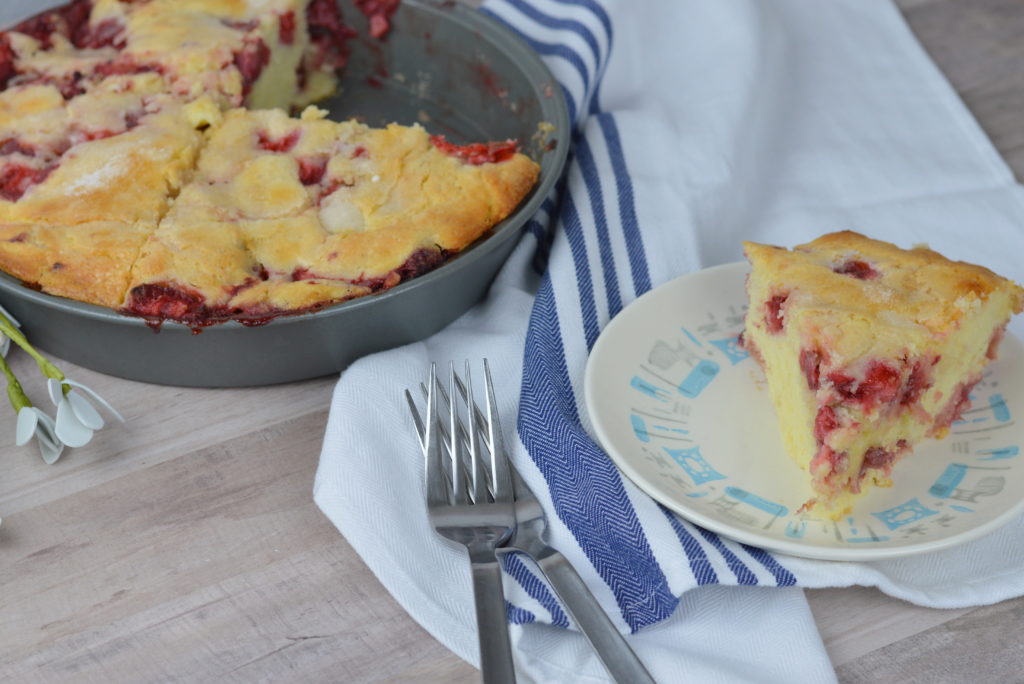 This Strawberry Cake is so simple to make, it's light, custardy and full of fresh berries. Your new favorite summertime treat!