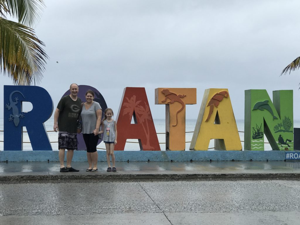 Are you traveling to Roatan, Honduras? I am telling you about our time in Roatan including hugging a sloth and horseback riding in the ocean.