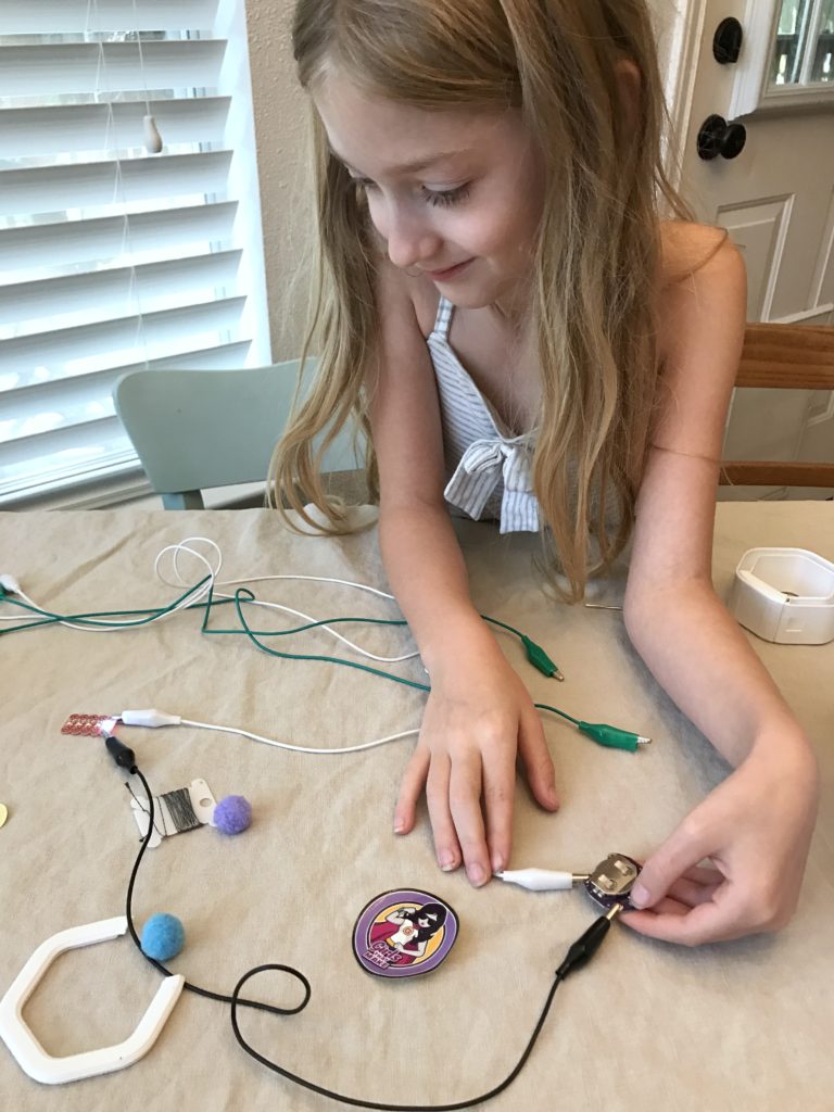 Looking for kids activities that focus on STEM? The Girls That Make subscription box is a fun way to expose kids to STEM while making wearable projects.