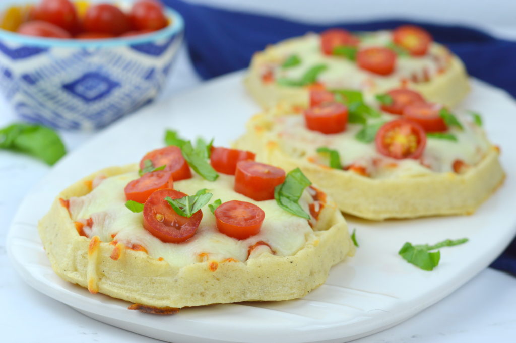 Waffle Pizzas are a family favorite all you need is your favorite pizza sauce, Eggo Thick & Fluffy waffles, mozzarella, cherry tomatoes, & basil - quick, easy, & yummy!