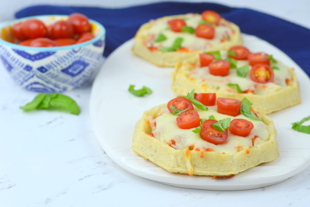 Waffle Pizzas are a family favorite all you need is your favorite pizza sauce, Eggo Thick & Fluffy waffles, mozzarella, cherry tomatoes, & basil - quick, easy, & yummy!