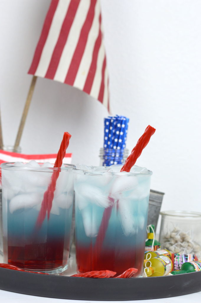 This festive kid friendly red, white, and blue layered drink is perfect for the 4th of July holiday. Your child will love this 4th of July drink.