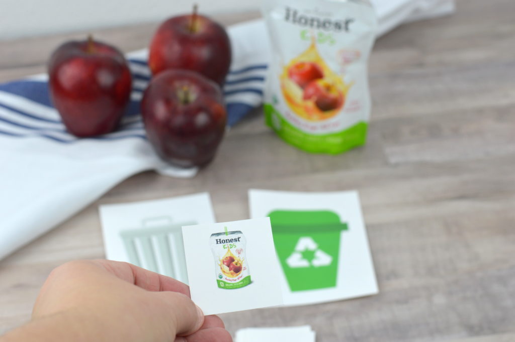 How to teach children about recycling, reducing waste, and saving our planet by playing a fun recycling game with free printable.