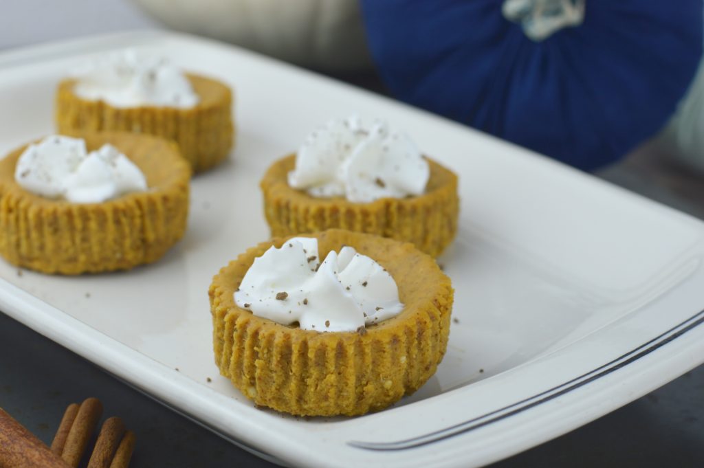 Everyone will love this delicious twist on traditional cheesecake at your next festive fall occasion. These creamy mini pumpkin cheesecakes with gingersnap cookie crusts are amazing! 