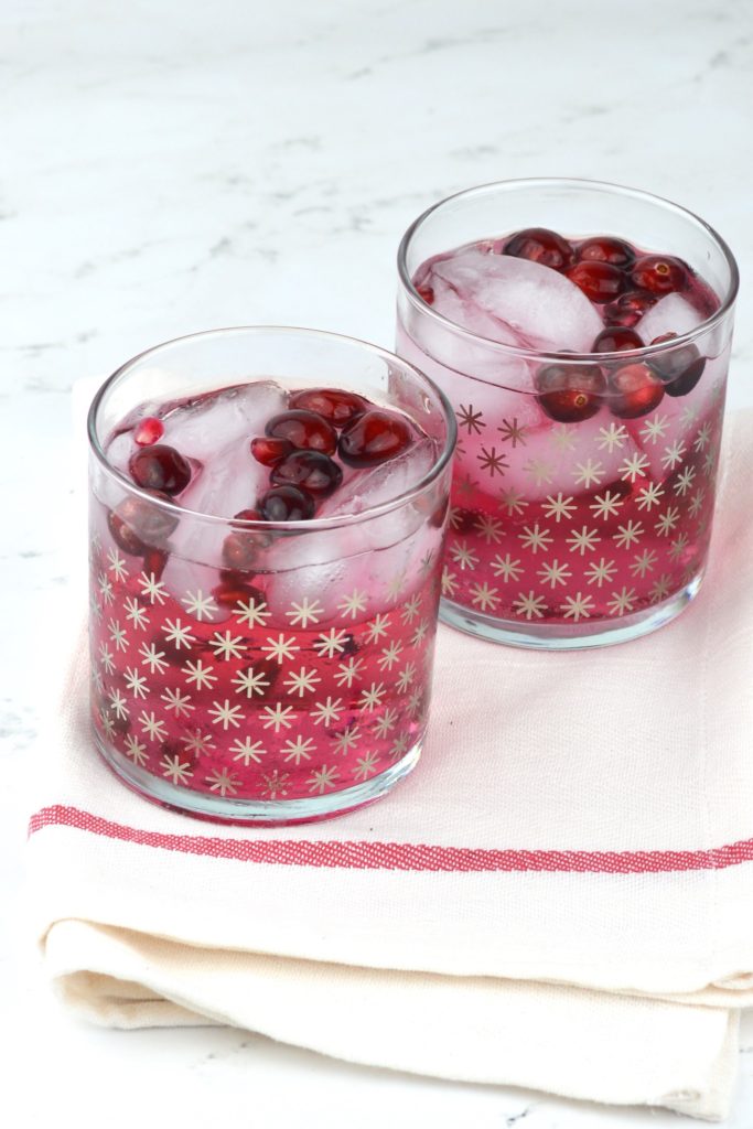 This Sparkling Cranberry Pomegranate Cocktail can be made both spiked or unspiked and is a delicious addition to any party!