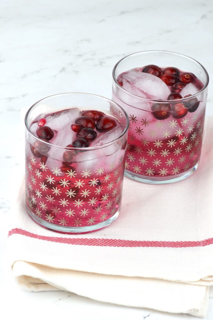 This Sparkling Cranberry Pomegranate Cocktail can be made both spiked or unspiked and is a delicious addition to any party!