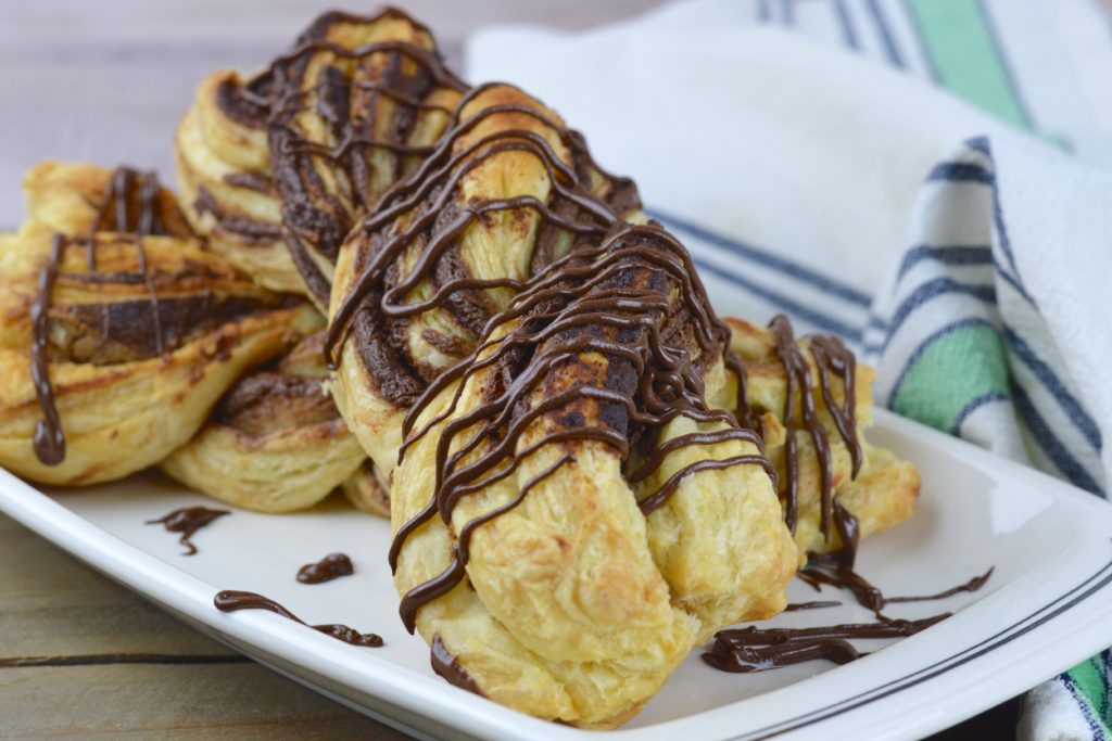 This really simple and super delicious, Chocolate Twists recipe, has only four ingredients and makes for an impressive dessert.