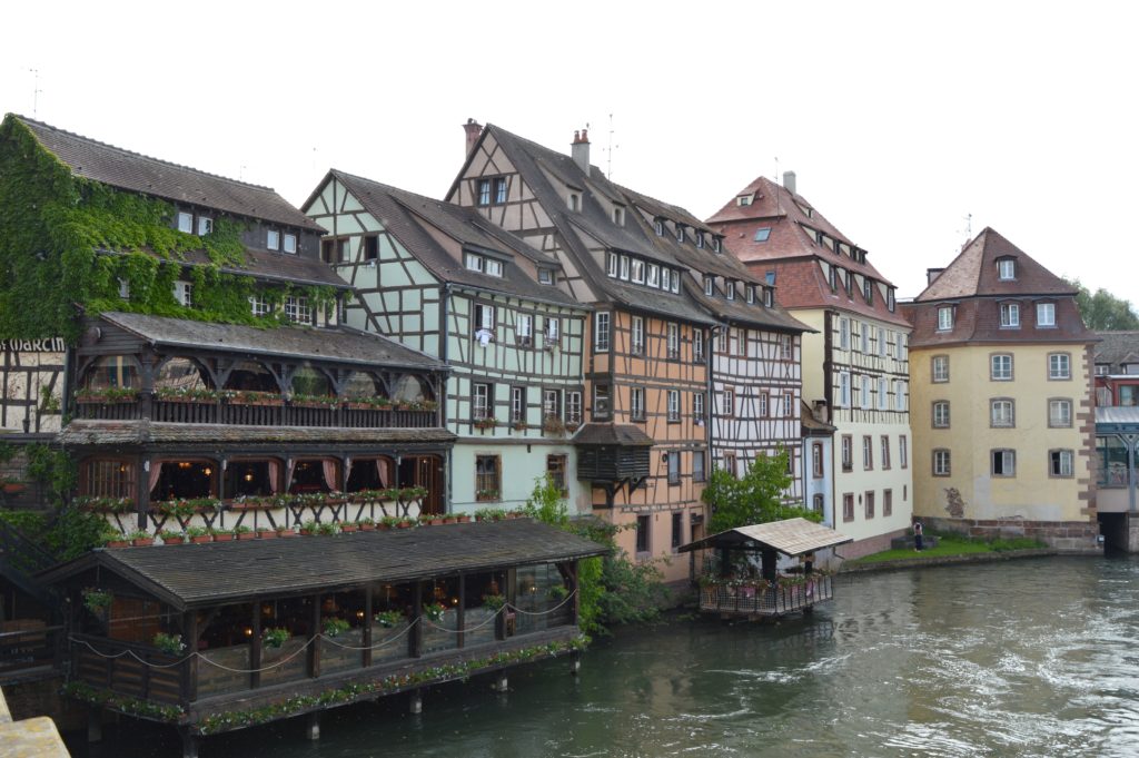 Picture-perfect towns are located throughout the Alsace region of France including Colmar and Strasbourg.  They are filled with half-timbered houses, overflowing flower pots, and lovely street cafes and look like they were plucked right out of a fairytale.