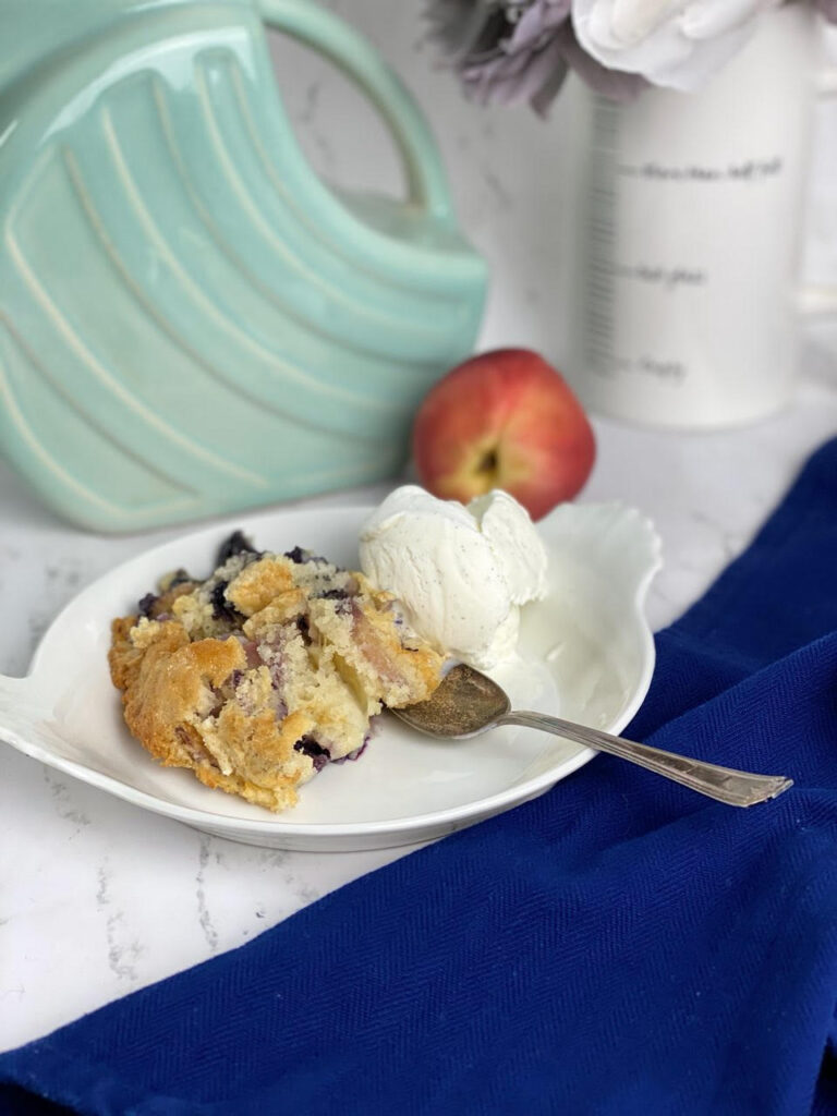 This easy, six-ingredient Peach Blueberry Cobbler recipe is bursting with flavor and comes out perfect every time!