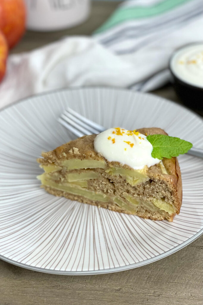 This light and airy olive oil cake is complemented by delicious apples and spices. It makes a wonderful dessert especially when served warm with ricotta cheese.