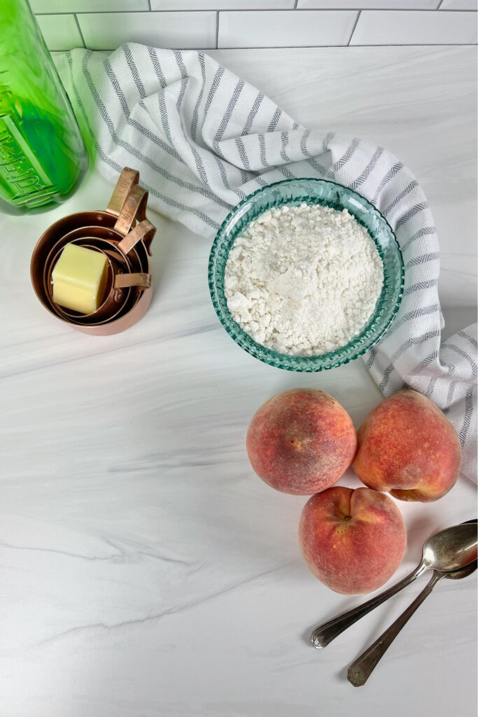 This easy, five-ingredient Peach Cobbler recipe is bursting with flavor and comes out perfect every time!