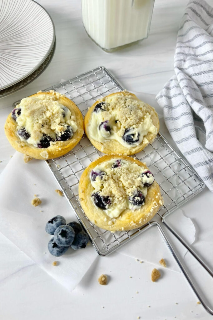 These easy-to-make Blueberry Cream Cheese Danish are a delicious breakfast (or snack or dessert) option that the whole family will enjoy!