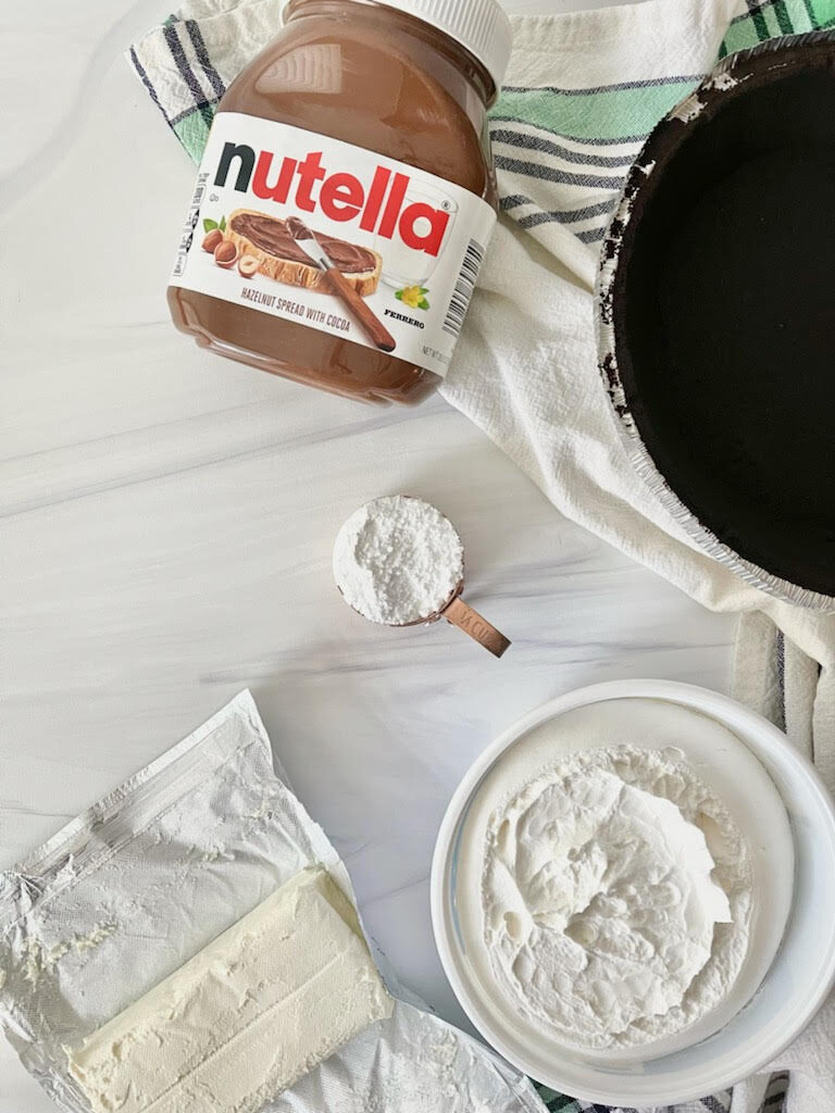 This creamy, chocolatey no-bake Nutella Cheesecake is the perfect summer-to-fall dessert!