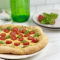 Are you always looking for quick dinner ideas that the whole family will enjoy? This flavorful and savory Three Cheese Pesto Pizza is a family favorite.