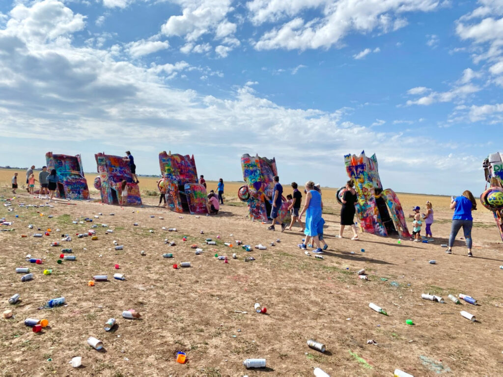 Everything you need to know about visiting Cadillac Ranch. This kitsch roadside attraction located near Amarillo, Texas is an experience you don't want to miss.