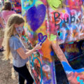 Everything you need to know about visiting Cadillac Ranch. This kitsch roadside attraction located near Amarillo, Texas is an experience you don't want to miss.