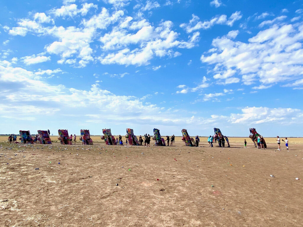 Everything you need to know about visiting Cadillac Ranch. This kitsch roadside attraction located near Amarillo, Texas is an experience you don't want to miss.