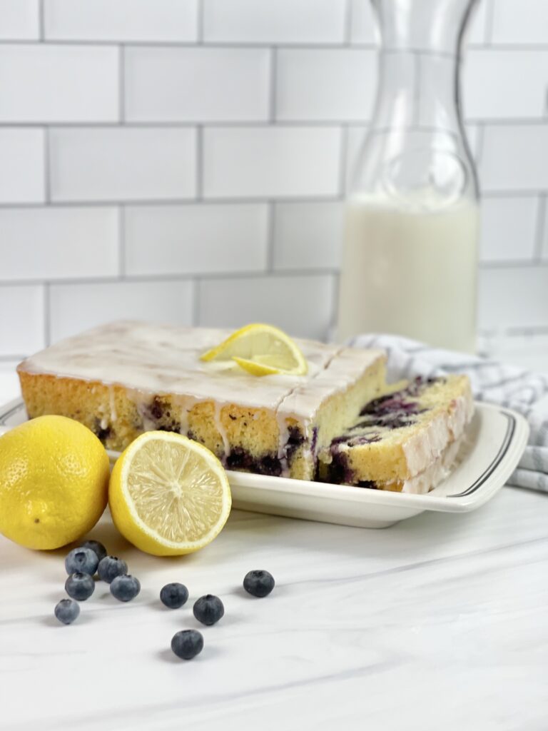 Are you a fan of blueberry lemon desserts? Then you need to try this Blueberry Lemon Loaf! It is full of bursting blueberries and lemon flavor with sweet lemon icing!