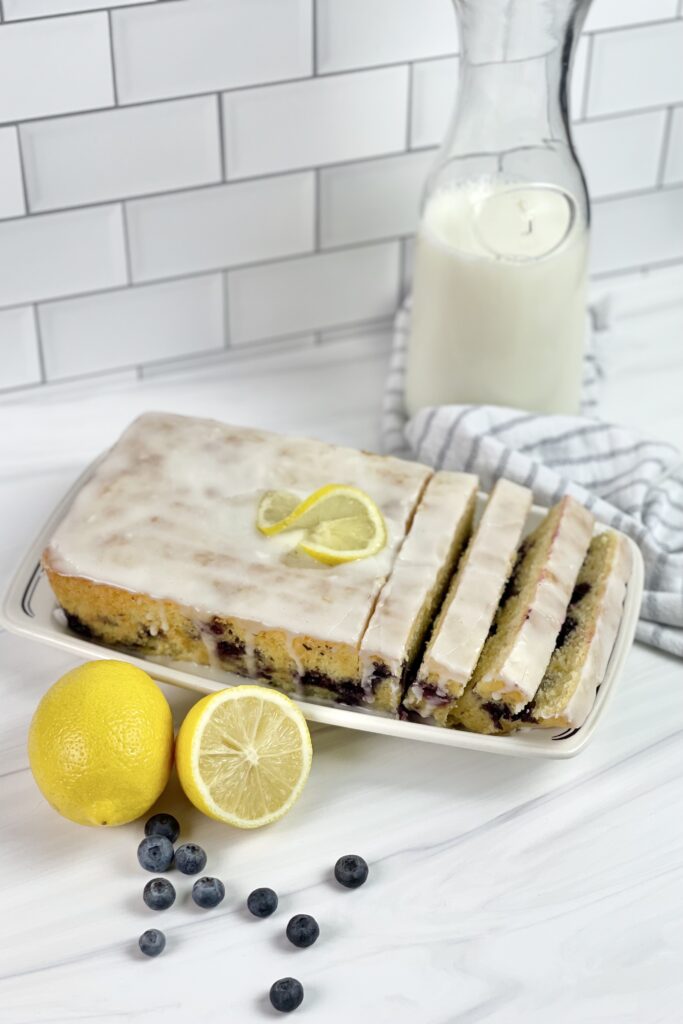 Are you a fan of blueberry lemon desserts? Then you need to try this Blueberry Lemon Loaf! It is full of bursting blueberries and lemon flavor with sweet lemon icing!