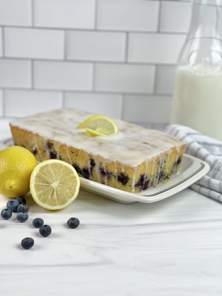Are you a fan of blueberry lemon desserts? Then you need to try this Blueberry Lemon Loaf! It is full of bursting blueberries and lemon flavor with sweet lemon icing!