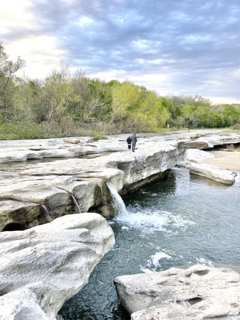 he 2.8-mile Onion Creek Hike and Bike Trail has a hard surface, good for strollers and road bikes. Take the Rock Shelter Trail (only for hikers) to see where early visitors camped. 