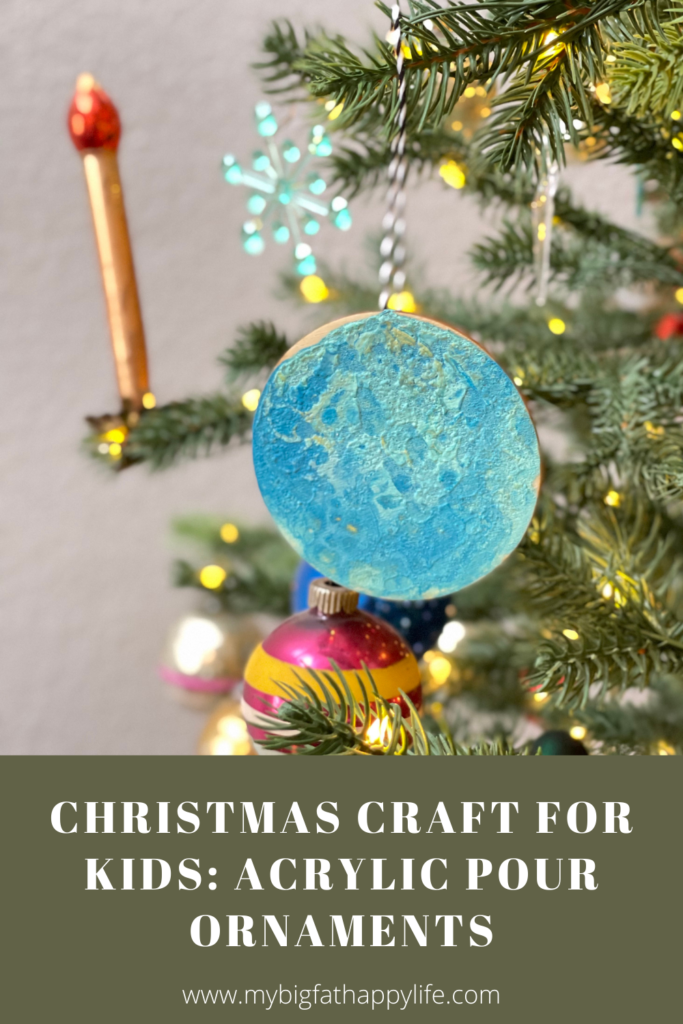 Full instructions on how to make Acrylic Pour Ornaments with kids! These make perfect gifts for grandparents and extended family members.