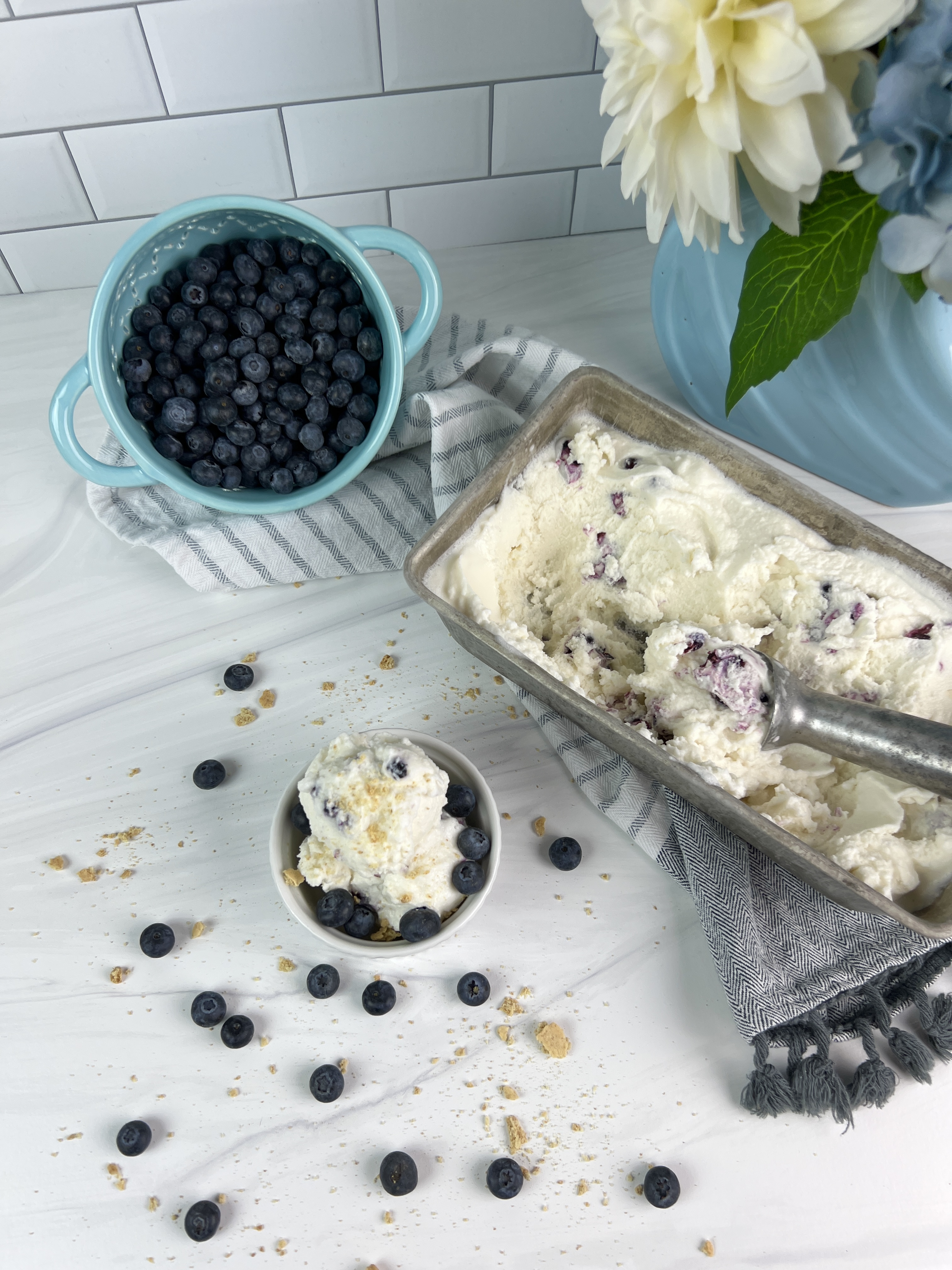 This creamy blueberry cheesecake ice cream is easy to make and a great way to cool off this summer!