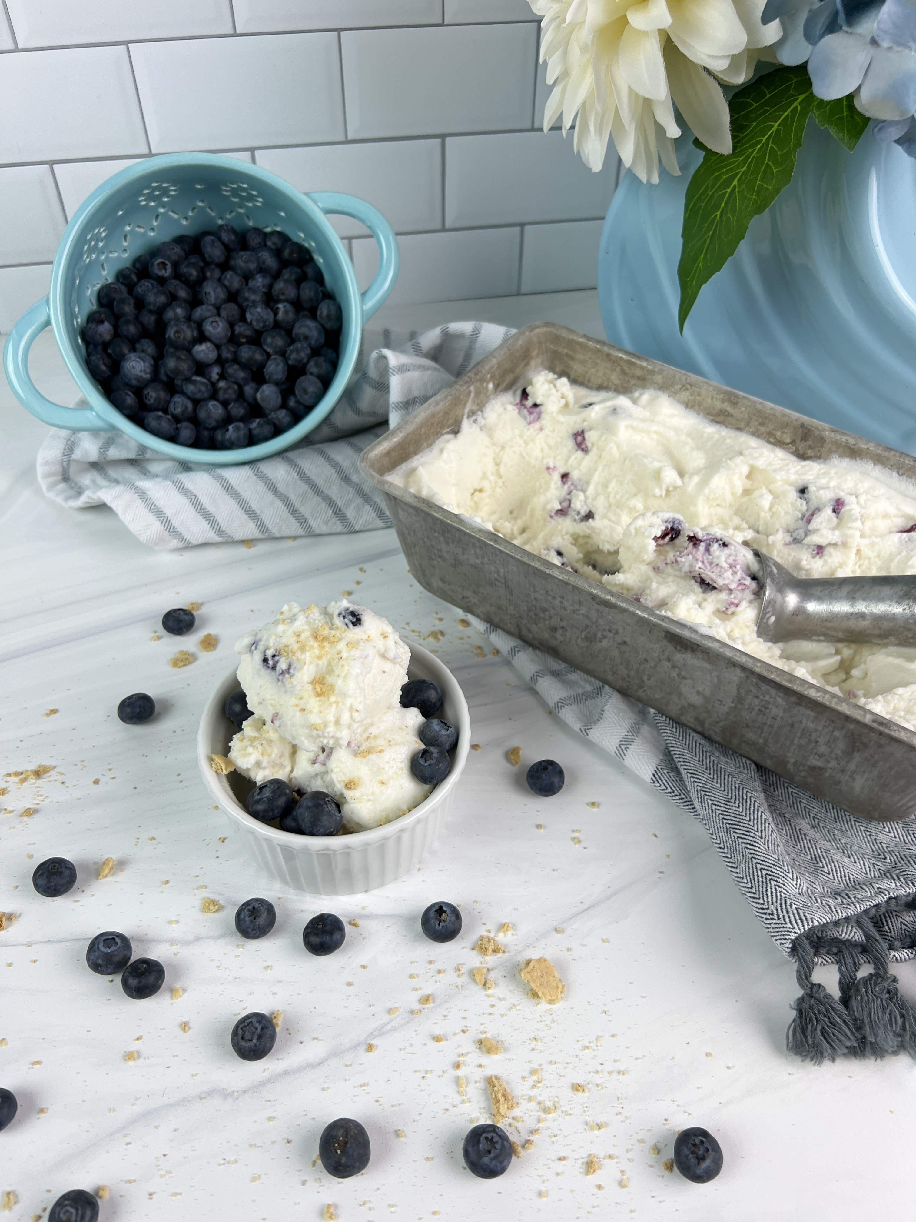 This creamy blueberry cheesecake ice cream is easy to make and a great way to cool off this summer!