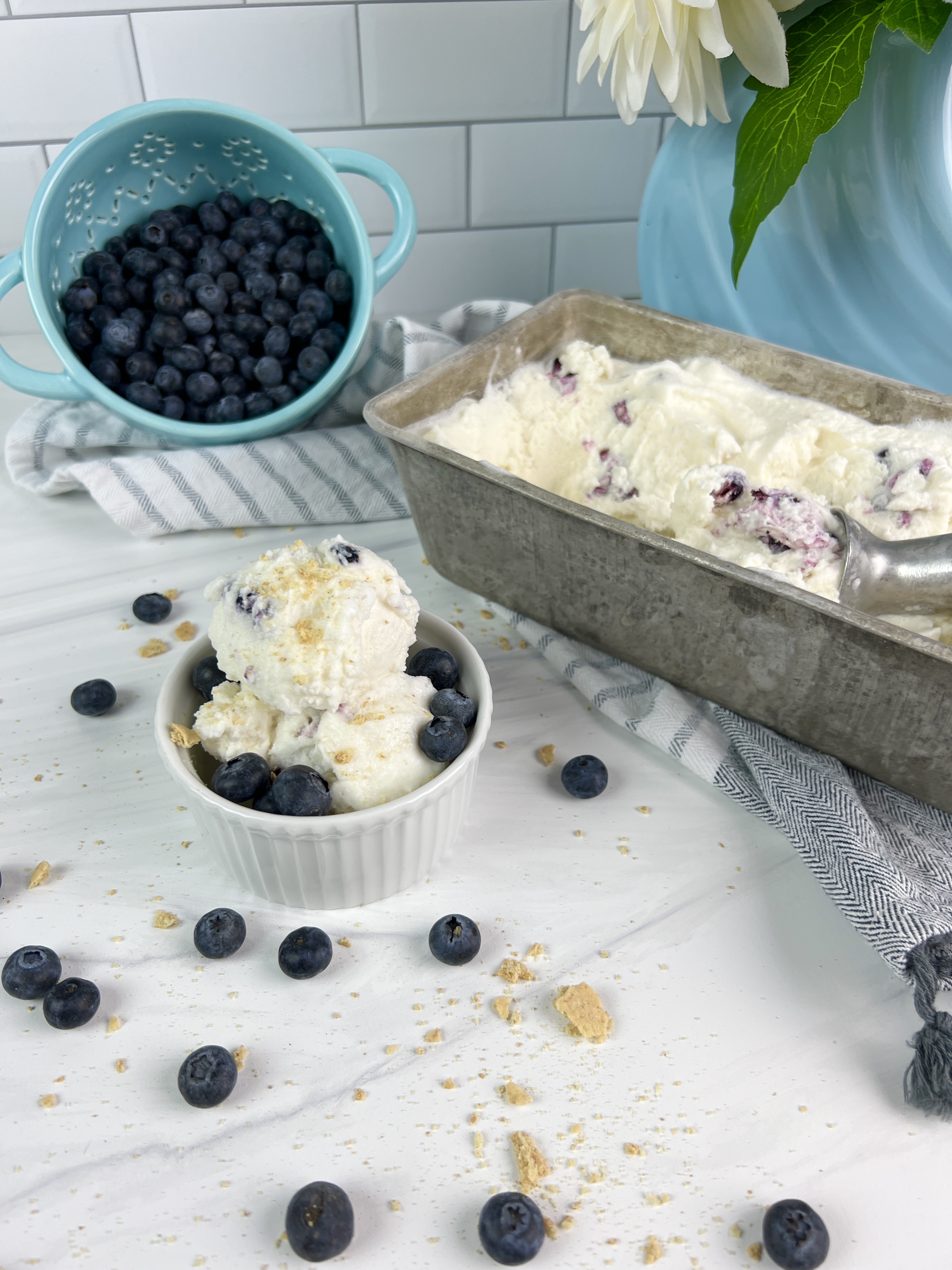 This creamy blueberry cheesecake ice cream is easy to make and a great way to cool off this summer!