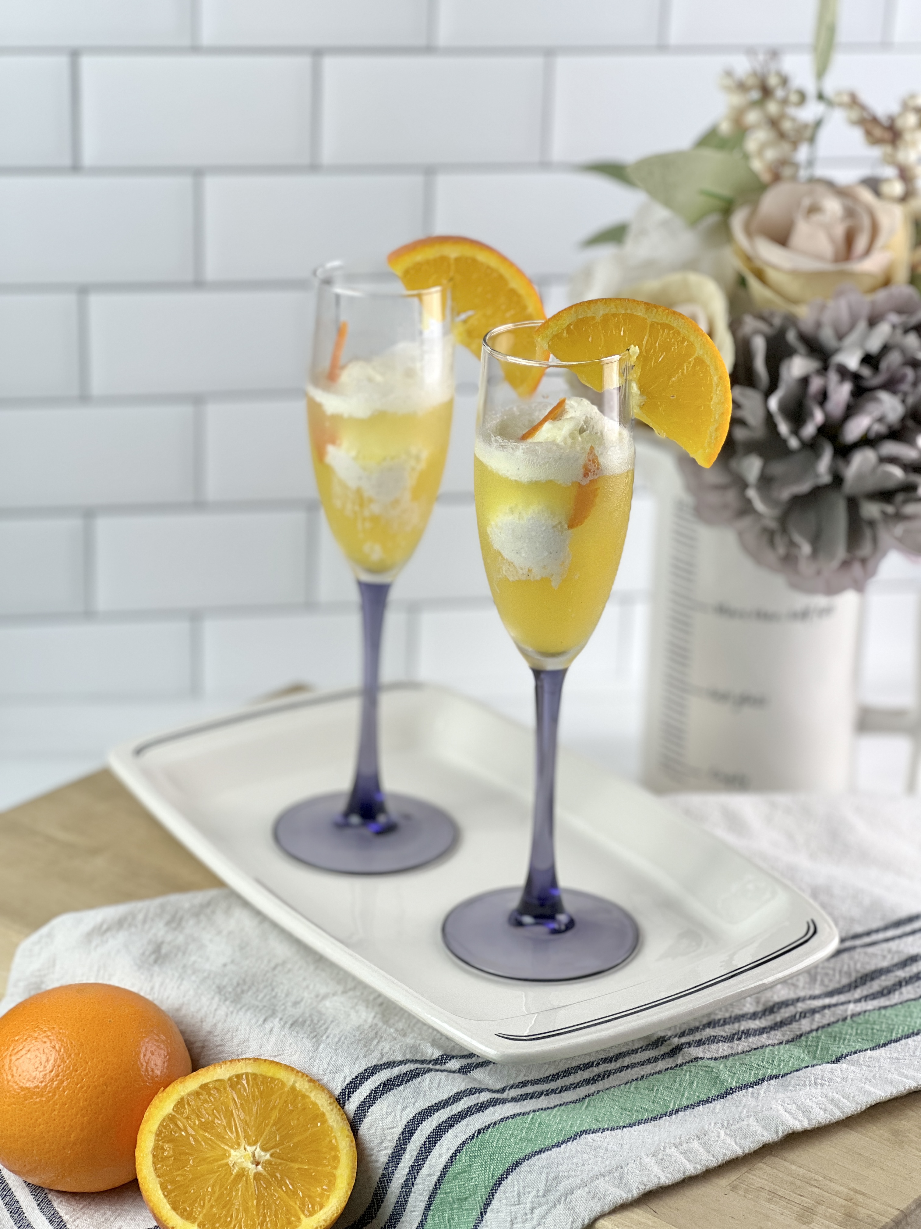 This mimosa float is the perfect fizzy brunch beverage or to spoil someone special with breakfast in bed.
