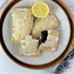 These Blueberry Lemon Pop Tarts are delicious and made using easy homemade pastry dough, blueberry compote, and lemon icing.