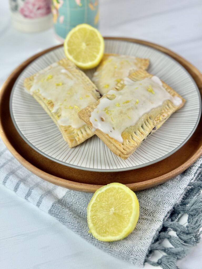 These Blueberry Lemon Pop Tarts are delicious and made using easy homemade pastry dough, blueberry compote, and lemon icing.